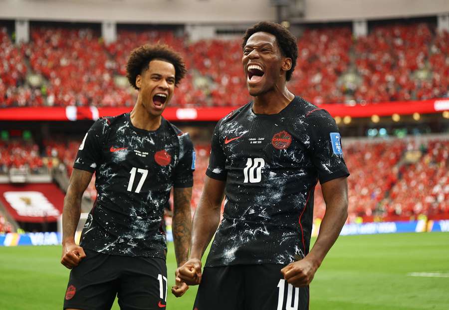 Tajon Buchanan and Jonathan David celebrate their side's second goal