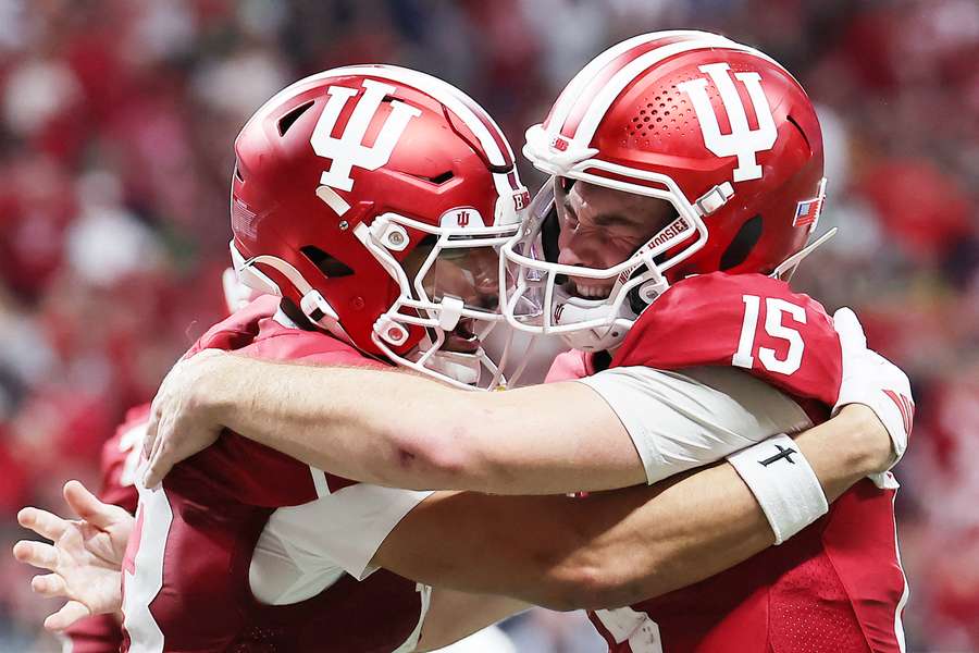 Indiana's  Elijah Sarratt (left) and Fernando Mendoza (right) celebrate win over Oregon in College Football Playoff