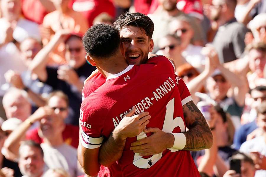 Szoboszlai celebrates with Liverpool teammate Alexander-Arnold