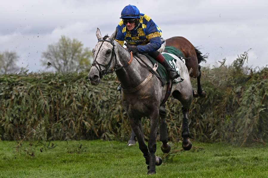 Jockey Sam Twiston-Davies rides 'Bill Baxter' to victory in the Topham Handicap Chase, over the Grand National fences on the second day of the Grand National Festival