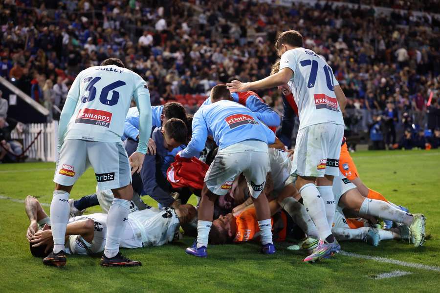 Sydney FC celebrate their win