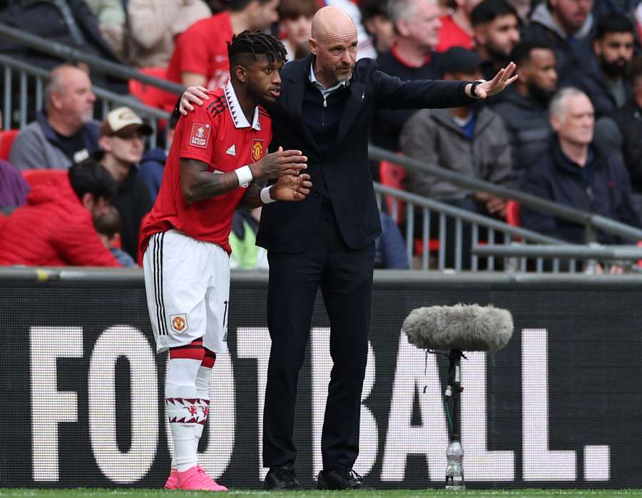 Erik ten Hag gives instructions to Manchester United's Brazilian midfielder Fred Erik ten Hag gives instructions to Manchester United's Brazilian midfielder Fred