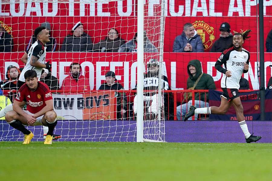 Fulham's Alex Iwobi, right, celebrates scoring his side's second goal 
