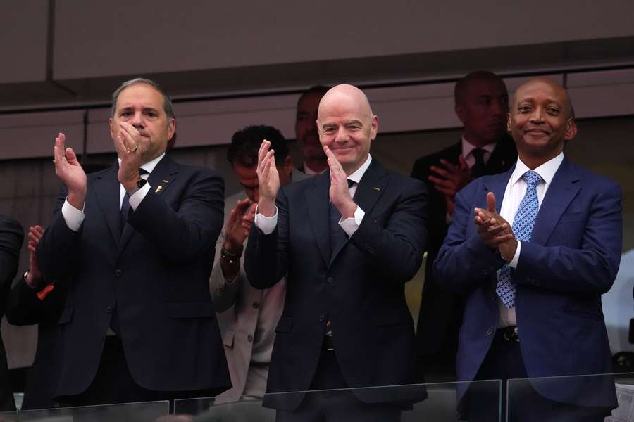 CONCACAF President Victor Montagliani, FIFA President Gianni Infantino and CAF President Patrice Motsepe at the World Cup