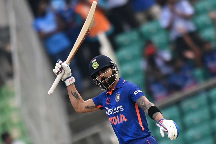 Kohli celebrates after scoring his latest century