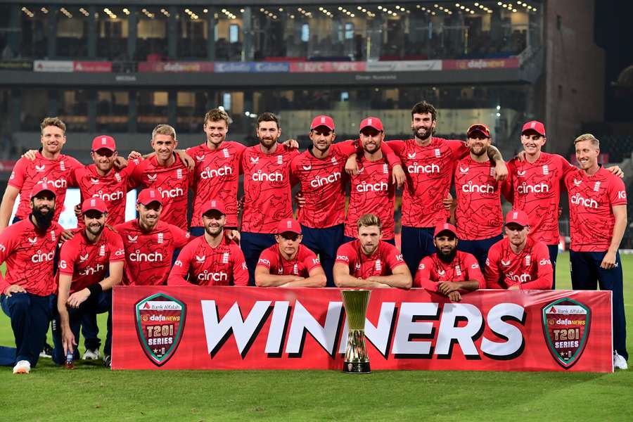 England's players pose with the trophy after winning the series