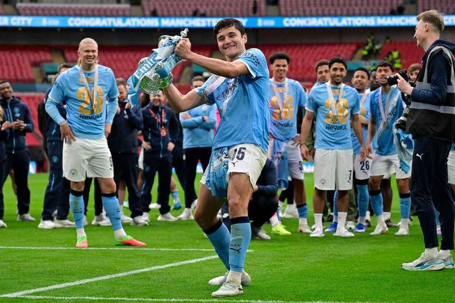 Abdukodir Khusanov celebrates after Man City beat Chelsea in the FA Cup final last season