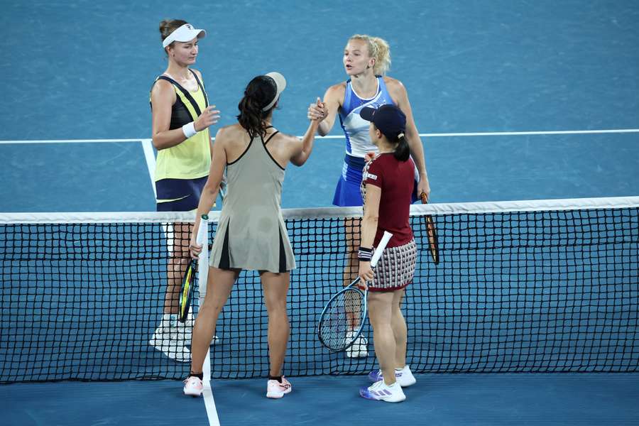 Czech Republic's Barbora Krejcikova and Katerina Siniakova (top) celebrate their win 