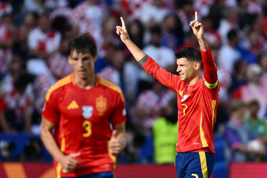 Spain forward Alvaro Morata (R) celebrates after scoring the opening goal