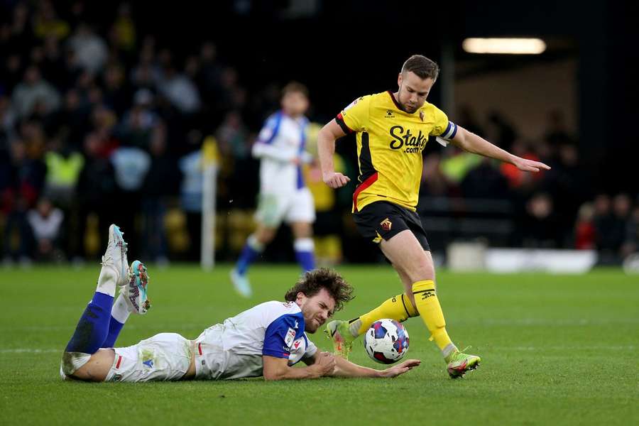 Cleverley (R) captaining Watford against Blackburn Rovers