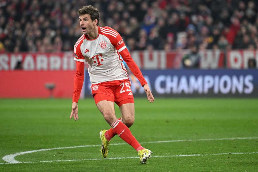 Bayern Munich's German forward #25 Thomas Mueller reacts during the UEFA Champions League round of 16