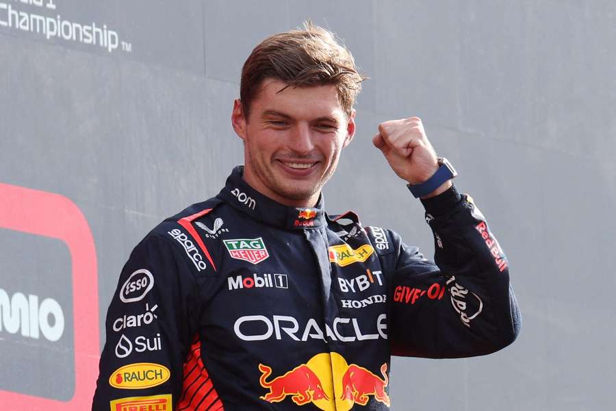 Max Verstappen punches the air after winning the Italian GP