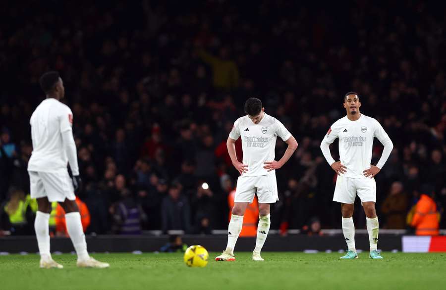 Arsenal's Declan Rice and William Saliba look dejected after Liverpool's Luis Diaz scored their second goal