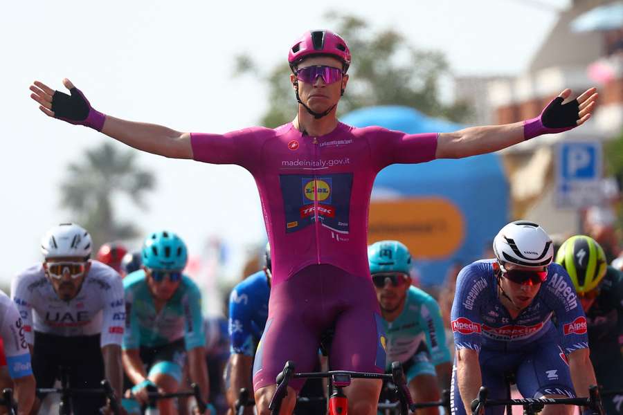 Italian rider Jonathan Milan (C) raking a second stage win on this Giro