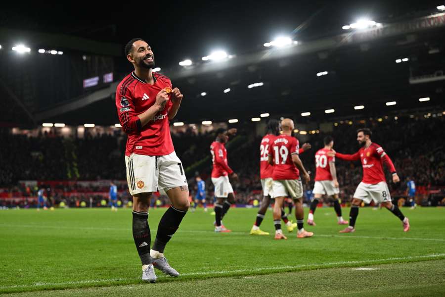 Matheus Cunha celebrates the goal that put Manchester United ahead 4-3. Matheus Cunha celebrates the goal that put Manchester United ahead 4-3.