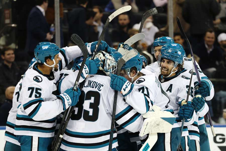The San Jose Sharks finally got their first win of the NHL season on a busy Thursday night. The San Jose Sharks finally got their first win of the NHL season on a busy Thursday night.
