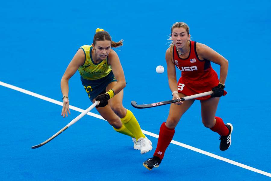 Rebecca Greiner of Australia in action with Ashley Sessa of United States