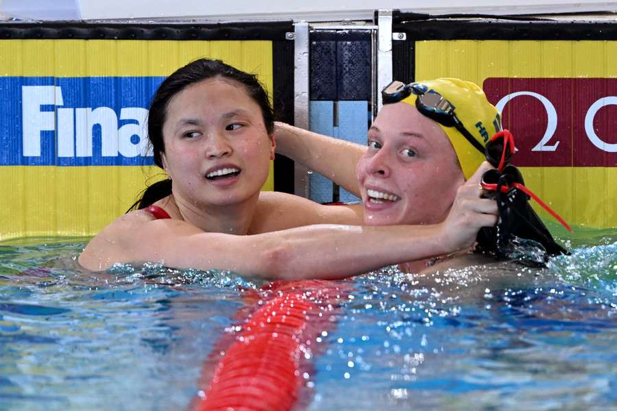 MacNeil (L) celebrates her win alongside Louise Hansson of Sweden (R)