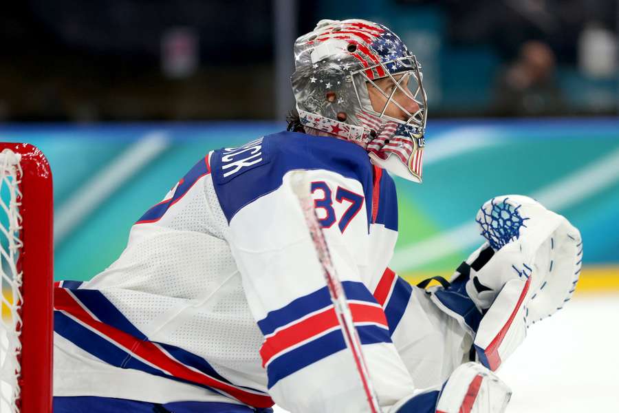 Team USA goaltender Connor Hellebuyck looks on during a game Team USA goaltender Connor Hellebuyck looks on during a game