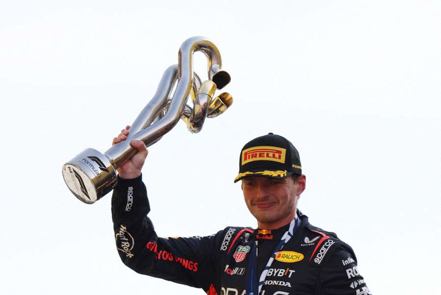 Max Verstappen lifts the trophy at Monza after his 10th win