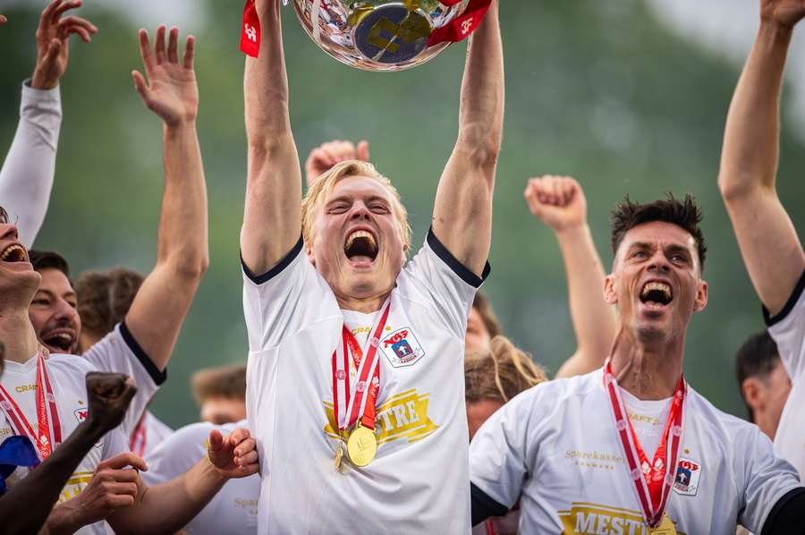 AGF's Tobias Bech lift the Danish Championship trophy AGF's Tobias Bech lift the Danish Championship trophy