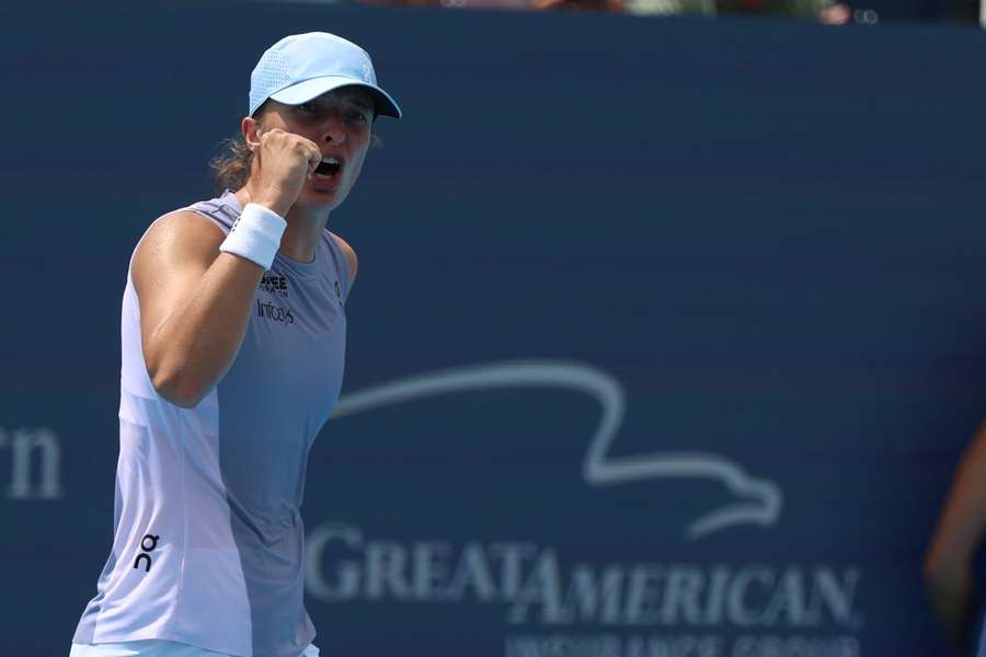 Swiatek celebrates against Cirstea