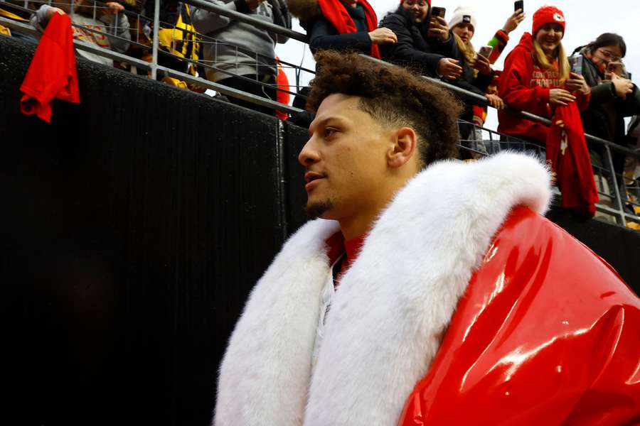 Patrick Mahomes walks off the field after the game 
