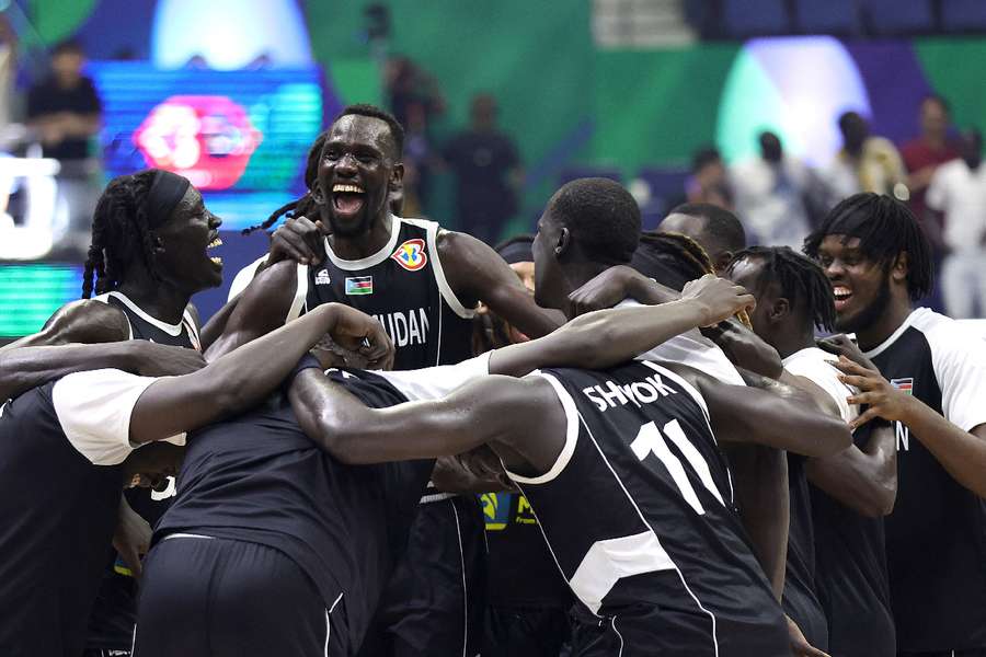 South Sudan players celebrate after winning the match