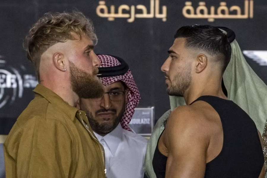 Jake Paul (L) and Tommy Fury (R) face off ahead of their fight on Sunday