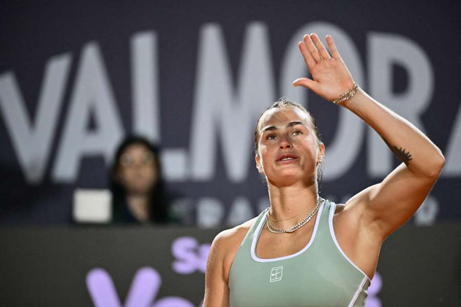 Aryna Sabalenka celebrates victory
