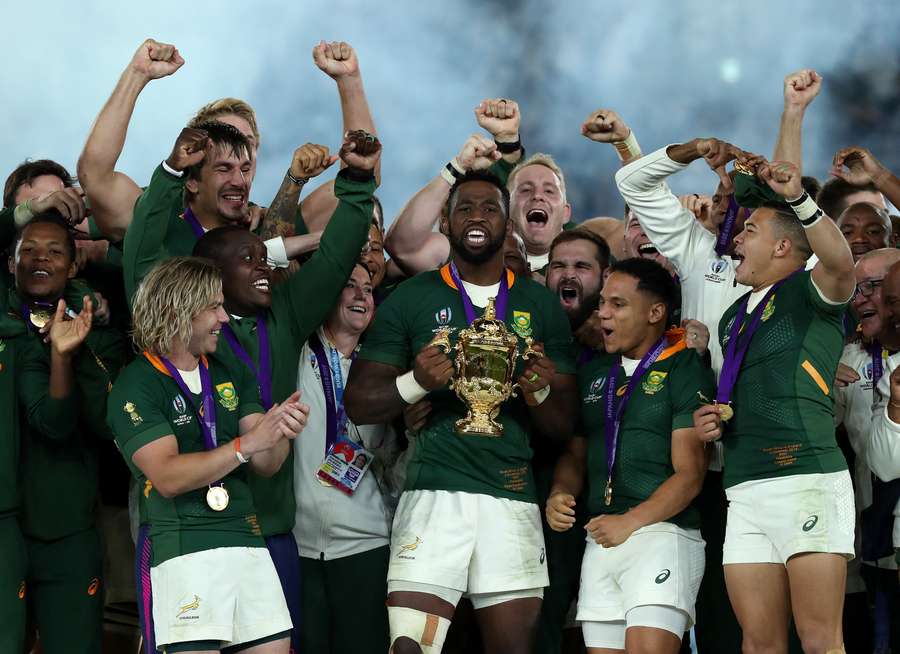 Siya Kolisi, the South Africa captain, raises the Webb Ellis Cup after their victory during the Rugby World Cup 2019 Final between England and South Africa
