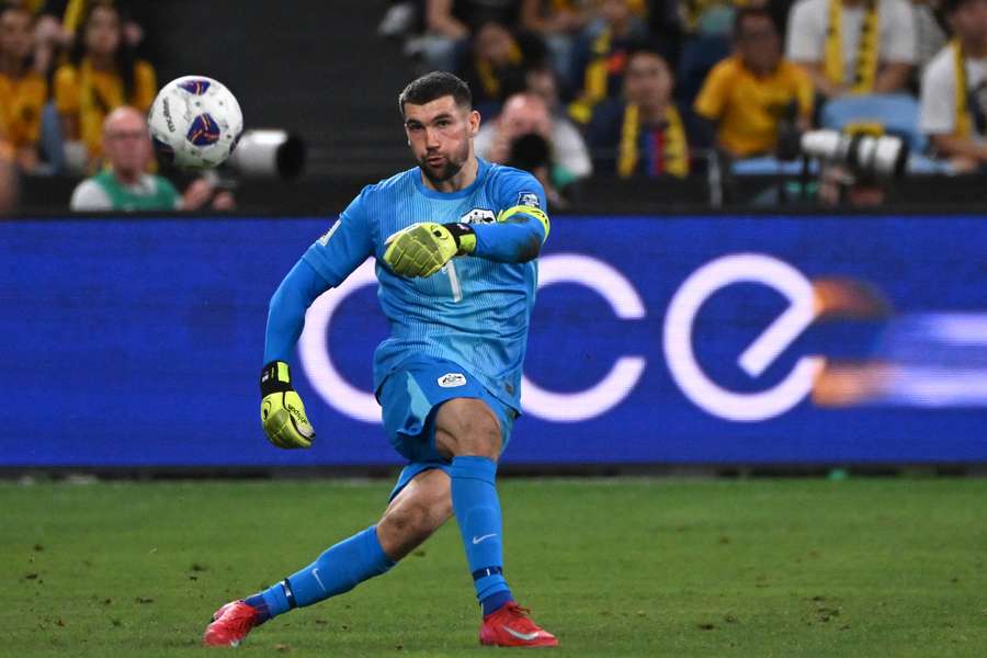Mat Ryan makes a pass during their World Cup 2026 Asian qualifier football match between Australia and Indonesia in Sydney