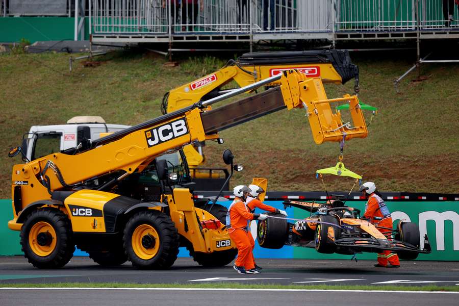 Oscar Piastri's McLaren is towed off the Sao Paulo track after he crashed out of the sprint race last weekend.