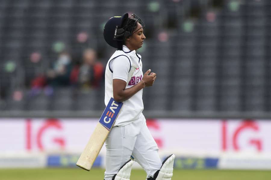 India's Harmanpreet Kaur walks after losing her wicket