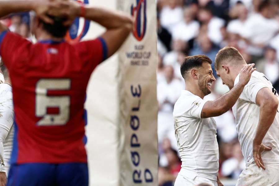 England's Danny Care and Jack Willis celebrate a try during their Pool D match against Chile