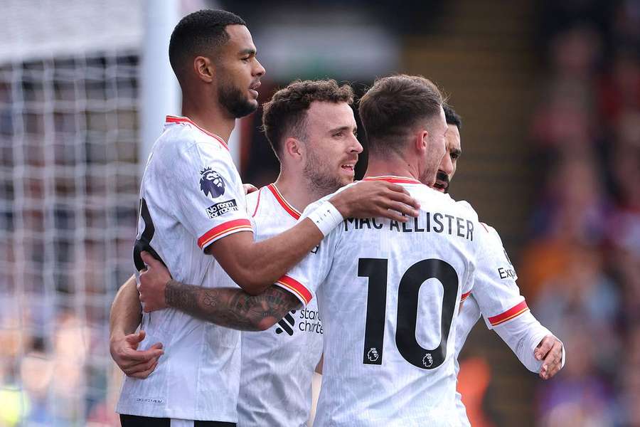 Les joueurs de Liverpool célébrant le but de Jota à la 8ᵉ minute contre Crystal Palace. 