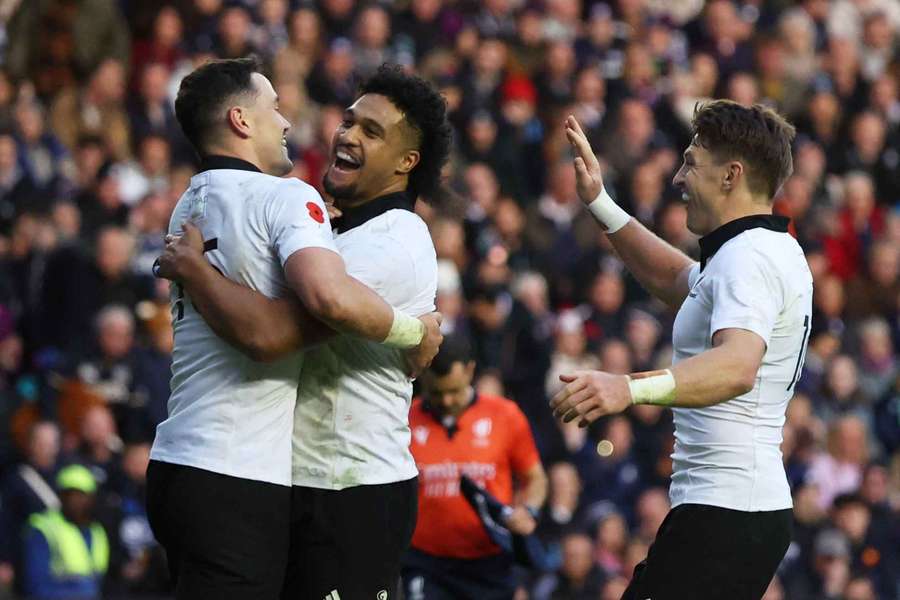 New Zealand's Will Jordan celebrates scoring a try with Leicester Fainga'anuku and Beauden Barrett New Zealand's Will Jordan celebrates scoring a try with Leicester Fainga'anuku and Beauden Barrett