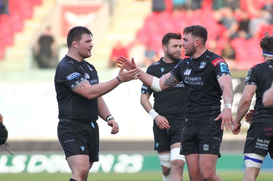 Glasgow Warriors' players celebrate reaching the Challenge Cup final