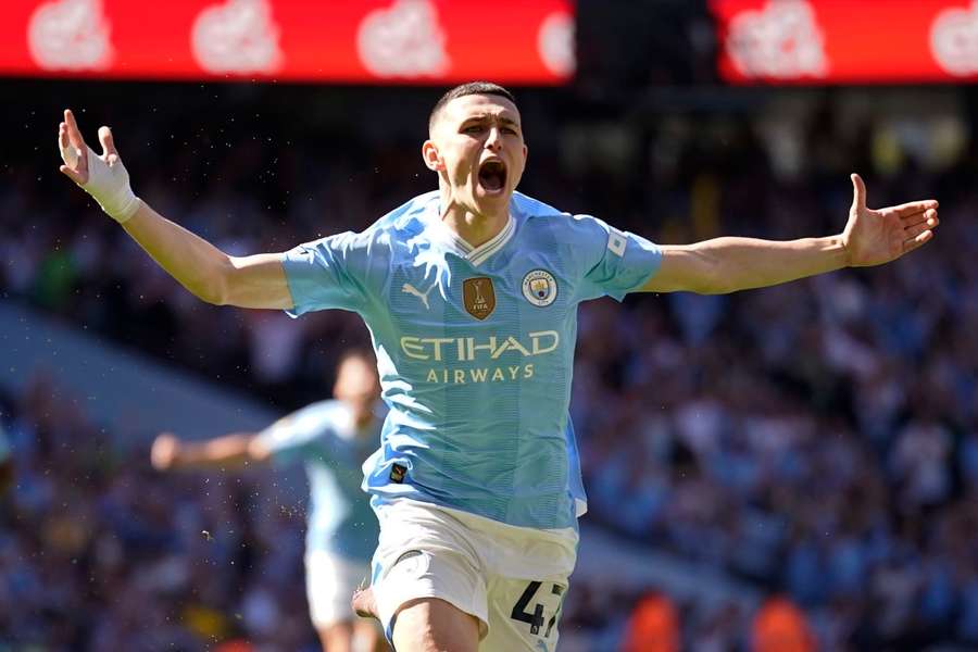 Phil Foden celebrates scoring for Manchester City