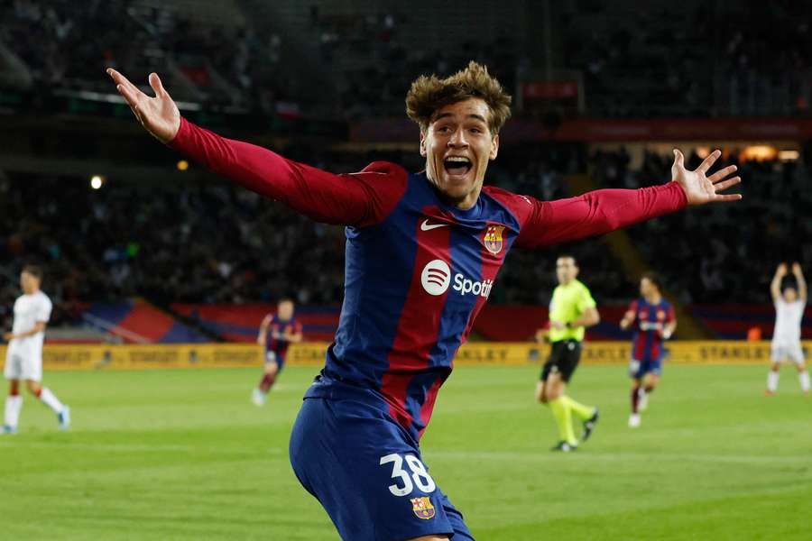Marc Guiu celebrates his goal for Barcelona