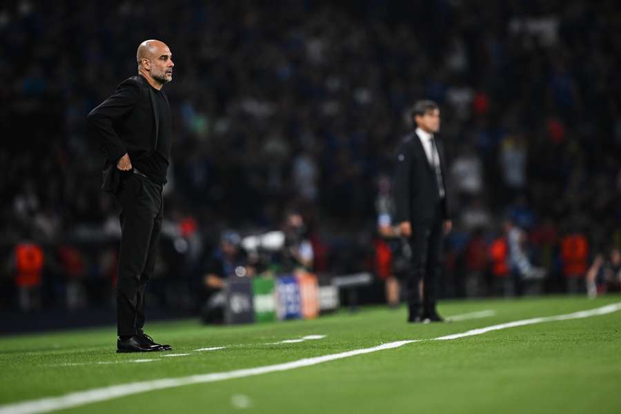 Pep Guardiola and Simone Inzaghi look on from the sidelines