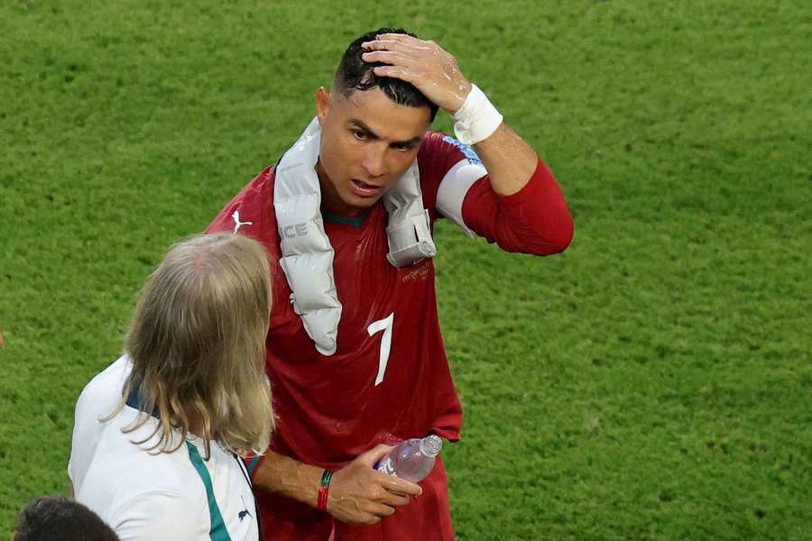 Cristiano Ronaldo makes use of an ice pack and cold water during a hydration break in Miami. Cristiano Ronaldo makes use of an ice pack and cold water during a hydration break in Miami.