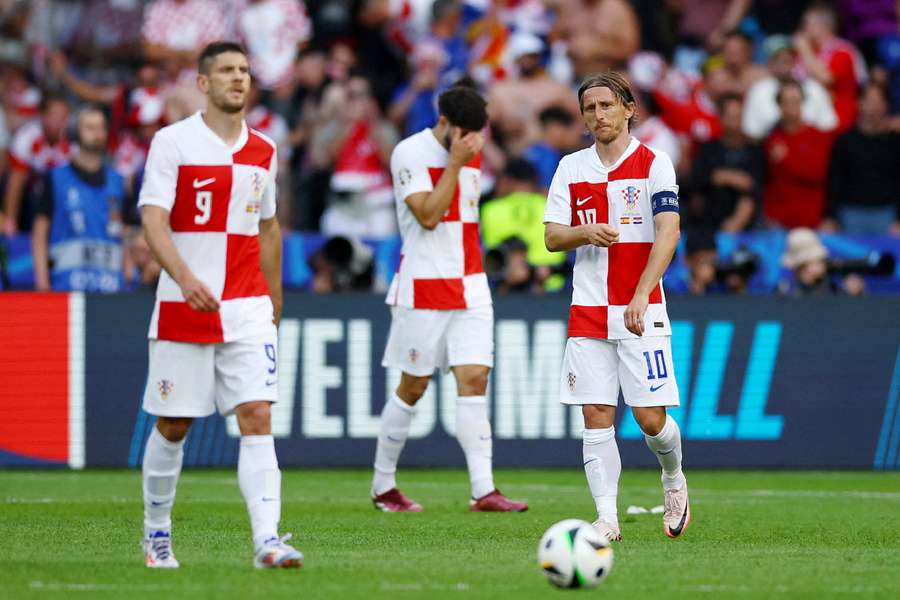 Croatia look dejected after conceding their third