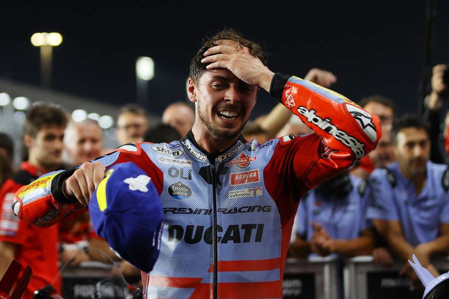 Fabio Di Giannantonio celebrates after winning the Grand Prix of Qatar