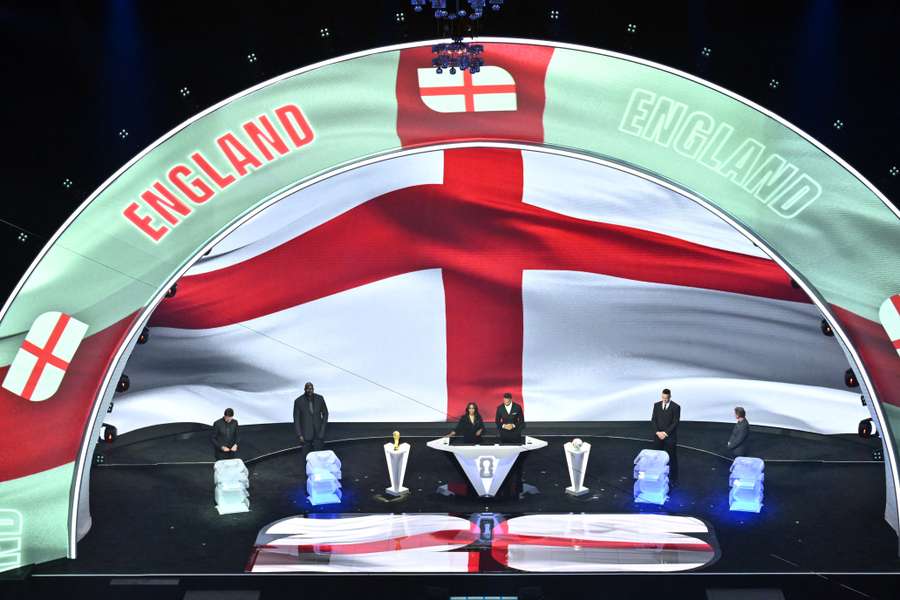 England's flag is displayed on a screen during the draw for the 2026 World Cup