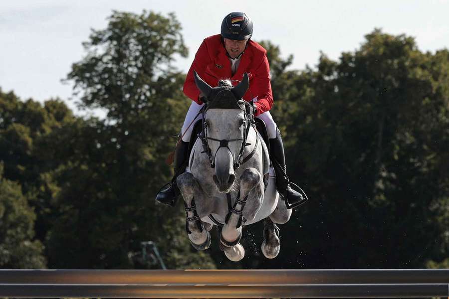 Germany's Christian Kukuk in action on Gelding Checker