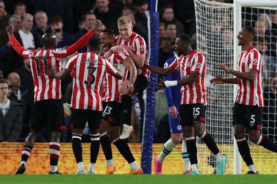 Brentford celebrate their opening goal against Chelsea