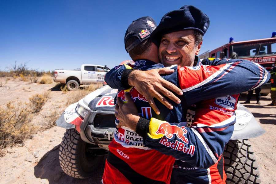 Dakar Rally champion Nasser Al-Attiyah celebrates with co-driver Mathieu Baumel at the 2023 World Rally-Raid Championship earlier this month