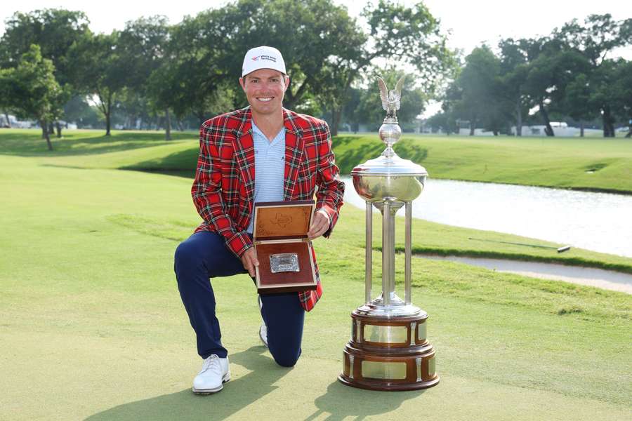 Ben Griffin (USA) posing with the Leonard Trophy after winning the 2025 Charles Schwab Challenge