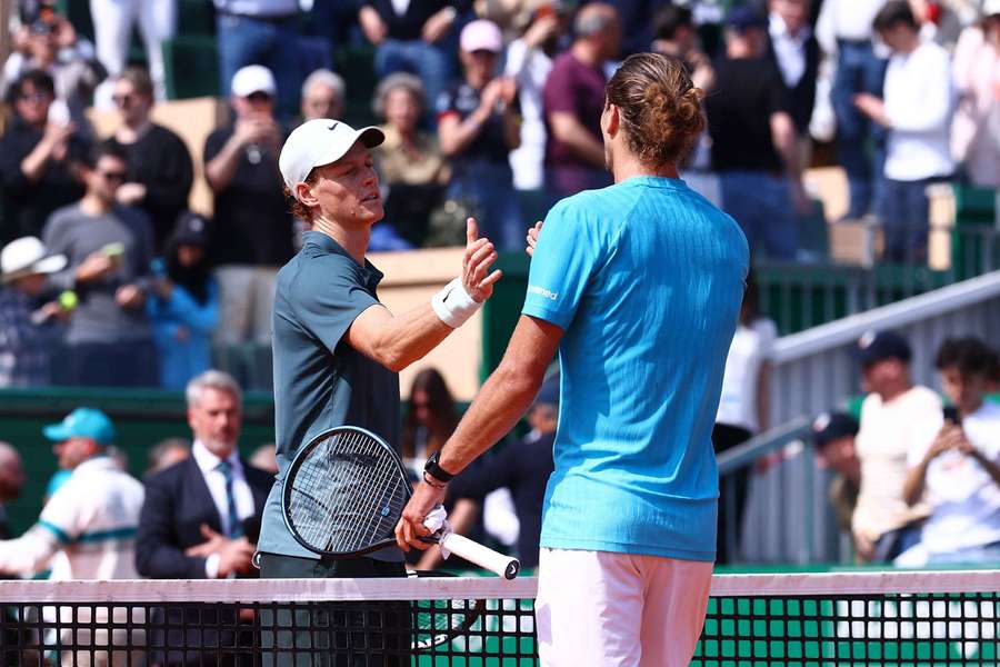 Jannik Sinner shakes hands with Alexander Zverev after winning their semi-final match Jannik Sinner shakes hands with Alexander Zverev after winning their semi-final match